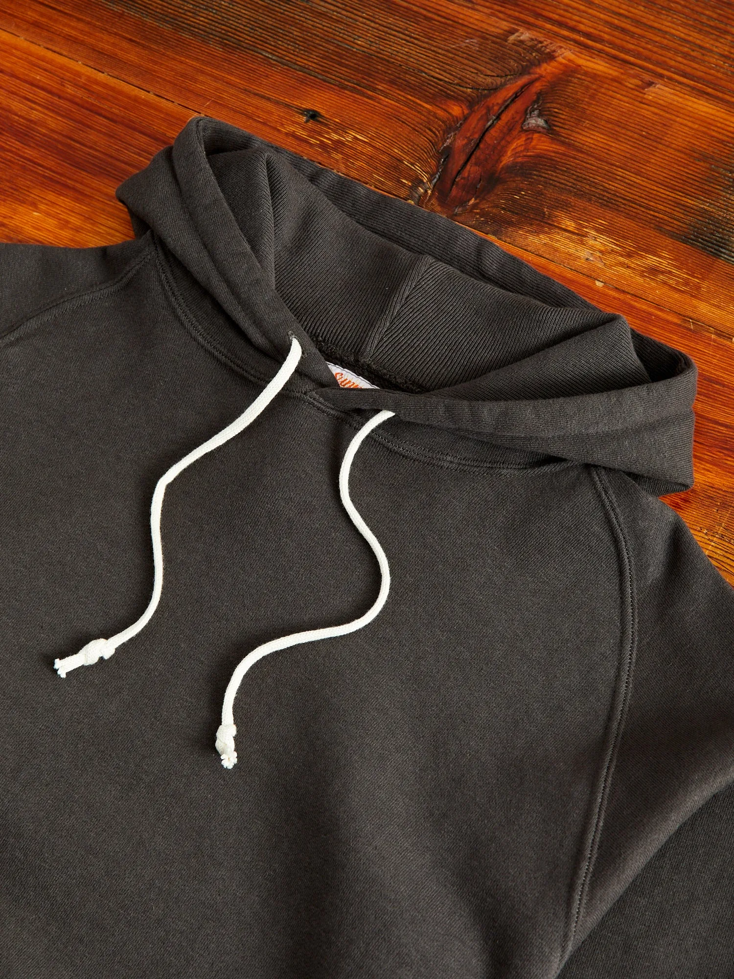 Ehu'kia Hooded Raglan Sweatshirt in Kokushoku Black