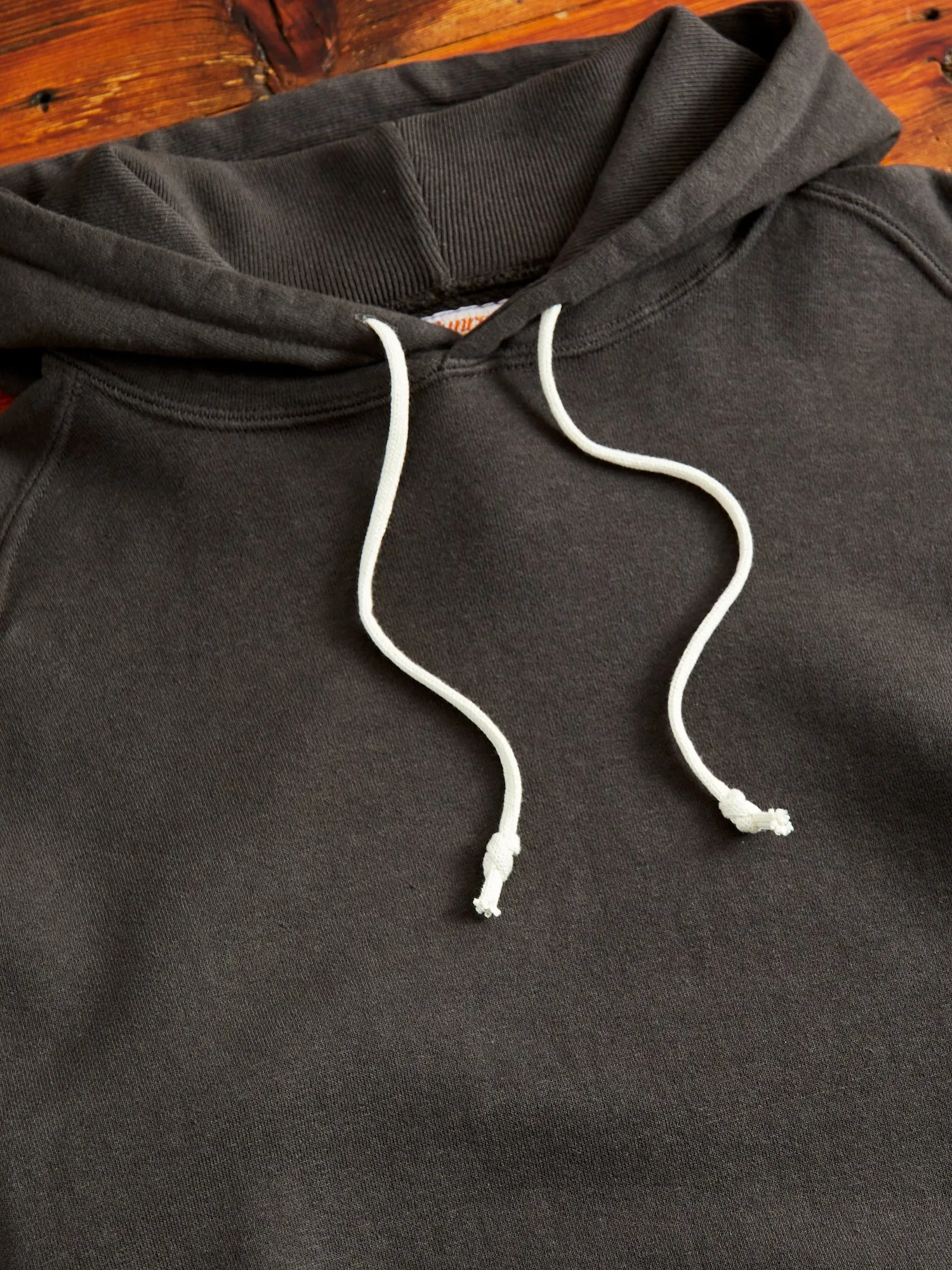 Ehu'kia Hooded Raglan Sweatshirt in Kokushoku Black