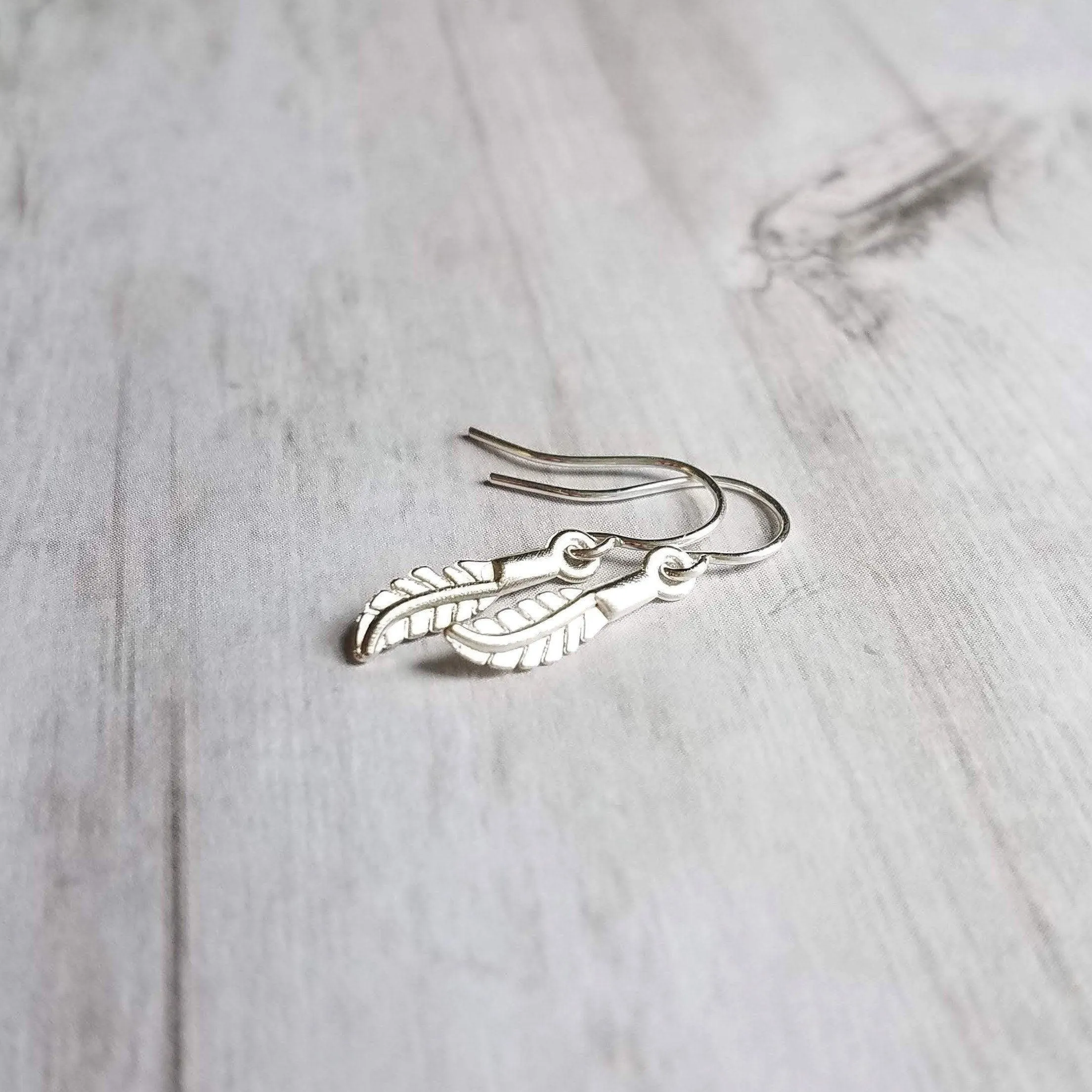 Silver Feather Earrings, .925 sterling silver hooks. tiny feather charm, small feather dangle, minimalist silver earring, simple feather, birthday anniversay gift