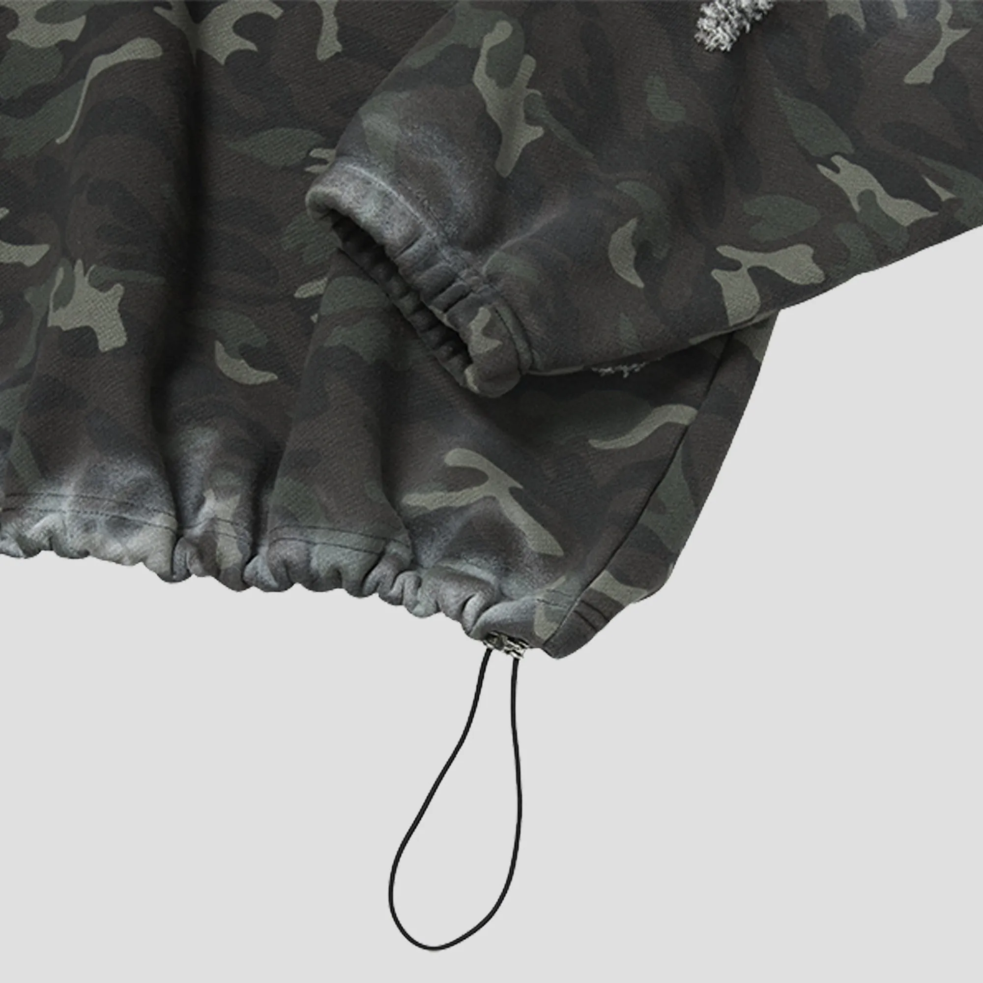 SPRAYED CAMO ROCK HOODIE